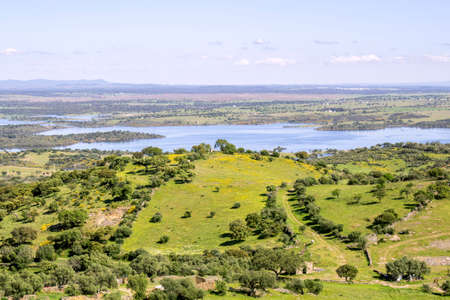 View from town of Monsaraz, on the right margin of the Guadiana River in Alentejo region, near Alqueiva dam and the border with Spain. Portugalの写真素材