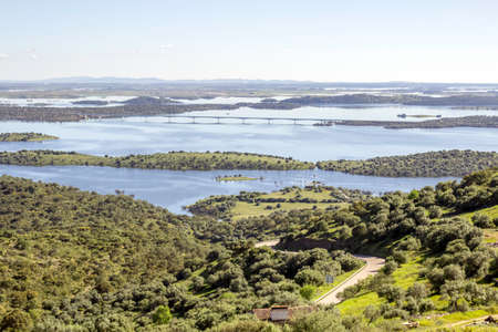 View from town of Monsaraz, on the right margin of the Guadiana River in Alentejo region, near Alqueiva dam and the border with Spain. Portugalの写真素材