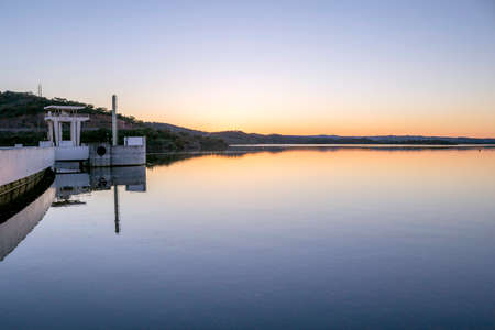 Alqueva Dam lake. It impounds the River Guadiana, on the border of Beja and Evora Districts in south of Portugal and constitutes one of the largest dams and artificial lakes (250 km²) in Western Europe.の写真素材