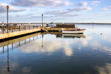 Ria Formosa natural conservation region fishing boat port in St.Luzia Algarve. Portugal.のeditorial素材