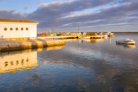 Ria Formosa natural conservation region fishing boat port in St.Luzia Algarve. Portugal.の写真素材