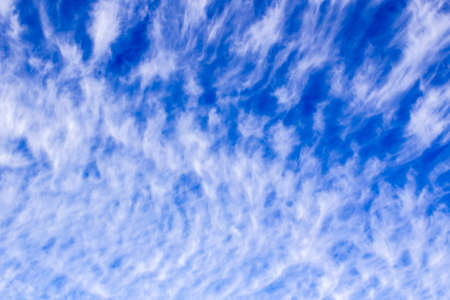 Cloudscape from below backgroundの写真素材