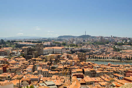 Panoramic view of old downtown, Porto cityscape, UNESCO World Heritage Site, on a summer day,...
