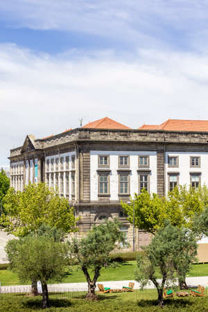 View of old downtown and renovated Lisboa square, Porto cityscape from clerigos tower, on a summer day, Portugal.のeditorial素材