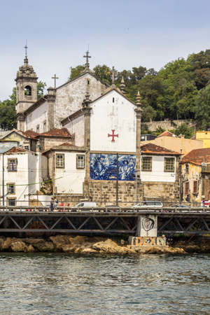 Panoramic from Douro river tour boat, view of Church Of Massarelos and Porto downtown cityscape, Portugal.のeditorial素材