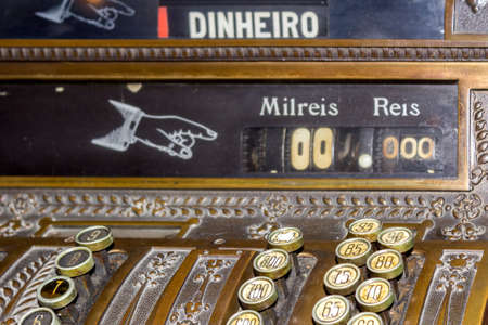 Keyboard closeup of an Antique cash register. Image useful as communication, economy and other concepts.のeditorial素材