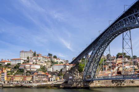 View of Ribeira historical quarter, on the margin Douro river embankment Oporto old town and  Luis I bridge, Porto, Portugal.の写真素材
