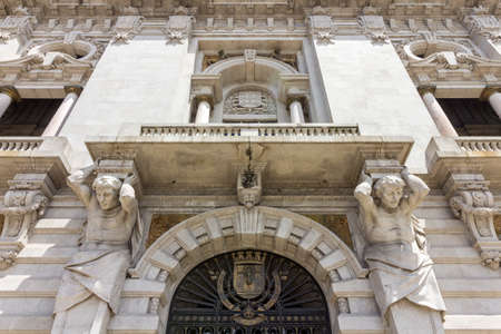 Porto City Hall facade detail, located at Avenida dos Aliados. A Neoclassical building designed by the architect Antonio Correia da Silva, construction started 1920. Porto, Portugal.の写真素材