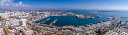 Aerial daytime view of Olhao fishing dock and seascape, waterfront to Ria Formosa natural park. Algarve. Portugal.の写真素材