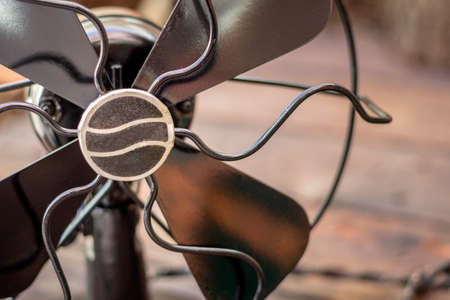 Close up detail shot of a antique 1920s home fan, vintage retro style concept.の写真素材