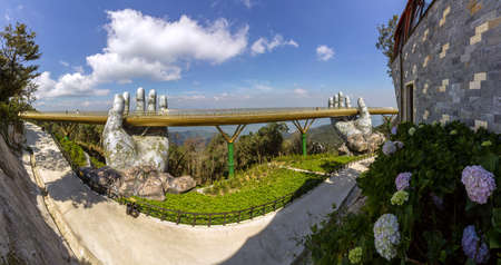 Da Nang, Vietnam - October 31, 2018: Golden Bridge known as âHands of Godâ, a pedestrian footpath lifted by two giant hands, open in July 2018 and a landmark at the famous tourist destination of Ba Na Hills in Da Nang, Vietnam.のeditorial素材
