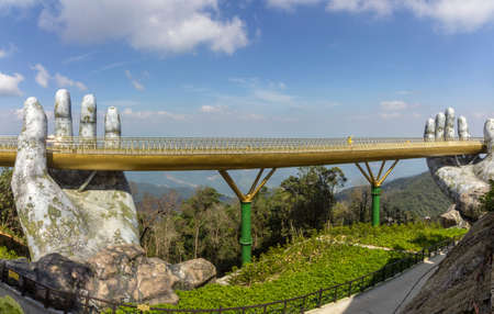 Da Nang, Vietnam - October 31, 2018: Golden Bridge known as âHands of Godâ, a pedestrian footpath lifted by two giant hands, open in July 2018 at Ba Na Hills in Da Nang, Vietnam.のeditorial素材