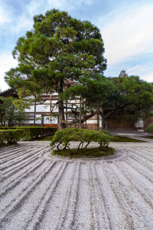 Ginkakuji temple of the Silver Pavilion, Japanese dry sand and gravel zen garden during autumn...