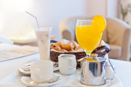 Full continental breakfast served in bed ready to takeの写真素材