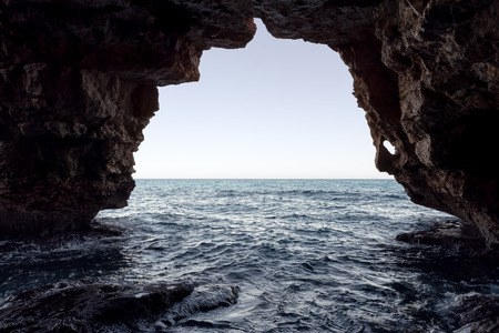 Cave of the Arches in the cove of Moraig in Valencia. Spain.の写真素材