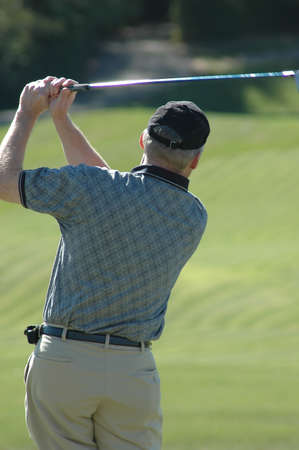 Golfer watching the ball after the swing