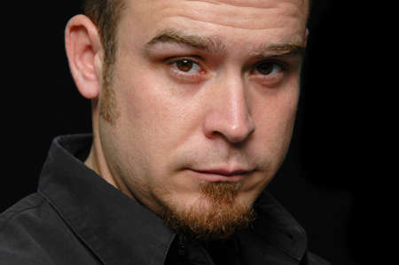 Portrait of man on a black background