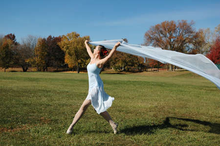 Dancer on a beautiful sunny day runningの写真素材