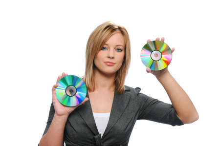 Businesswoman holding CDs isolated on whiteの写真素材