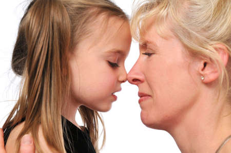 Mother and daughter profiles against a white background