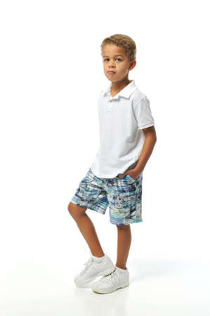 Boy posing with hands in his pocketの写真素材