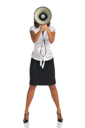 Young businesswoman with megaphone isolated on a white backgroundの写真素材