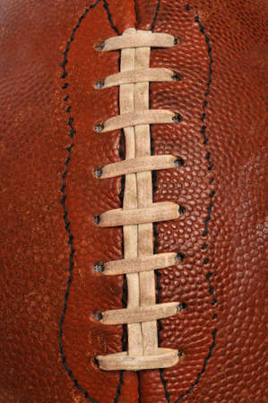 Oldf football close up showing the laces on a vertical formatの写真素材