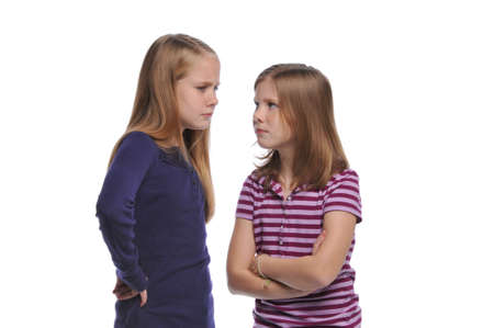 Two girl resolving a conflict isolated on a white backgroundの写真素材
