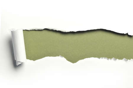 ripped white paper against a green background ripped white paper against a green background
