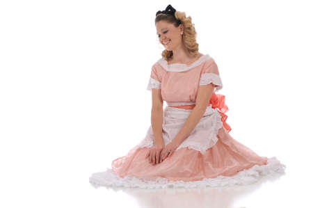 Ballerina wearing a pink dress and isolated on a white backgroundの写真素材