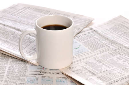 Businesspapers and cup of coffee isolated on a white backgroundの写真素材