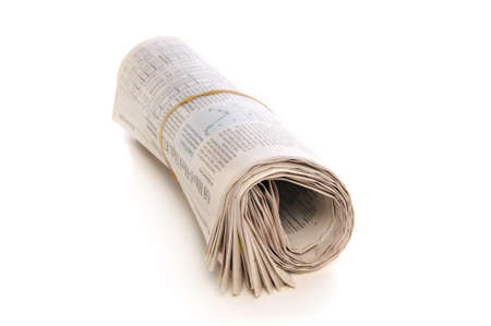 Roll of Newspaper isolated on a white backgroundの写真素材