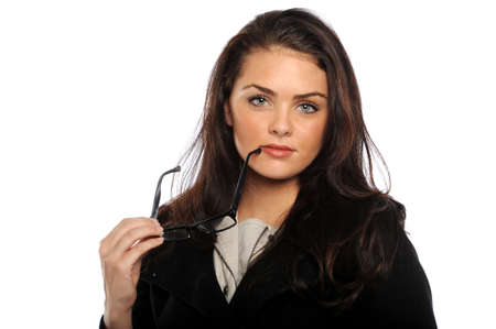 Young Businesswoman holding her glasses isolated on a white backgroundの写真素材