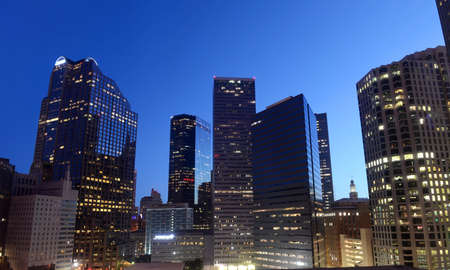 Downtown Dallas, Texas before dark with blue skiesの写真素材