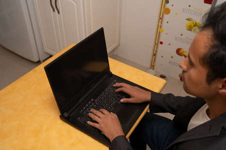 person typing on laptop