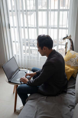 person working on laptopの写真素材