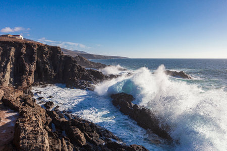 waves crashing on rocky beach