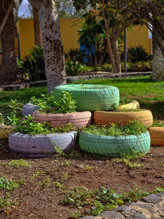 Old tires in the garden on a sunny day. Select focus.の写真素材