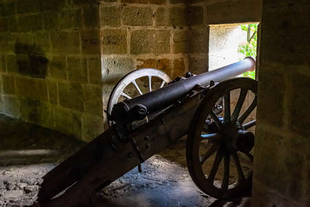 Cannon positioned to defend against enemy attack during medieval battles.の写真素材