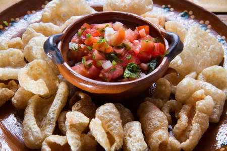 Chicharron and traditional mexican sauceの写真素材