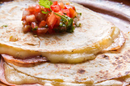 Traditional mexican sincronizada with ham and sauceの写真素材