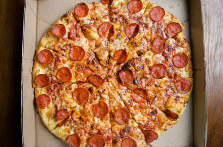 Traditional pepperoni pizza in a boxの写真素材