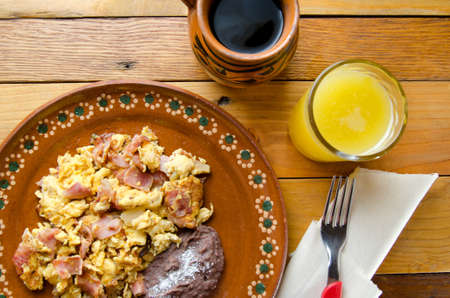 Mexican breakfast: Scrambled eggs with hamの写真素材
