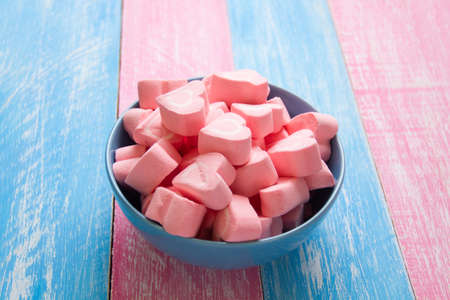 Pink heart marsmallow on bowlの写真素材