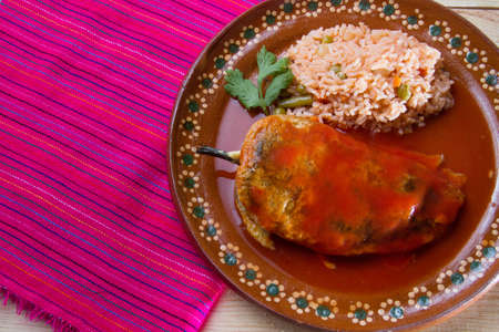 Mexican chile relleno and riceの写真素材