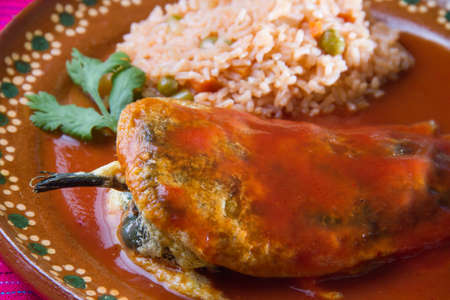 Mexican chile relleno and riceの写真素材