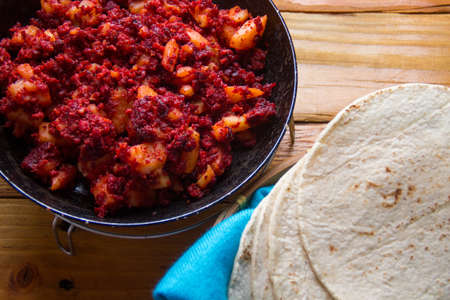 Authentic potatoes with chorizoの写真素材