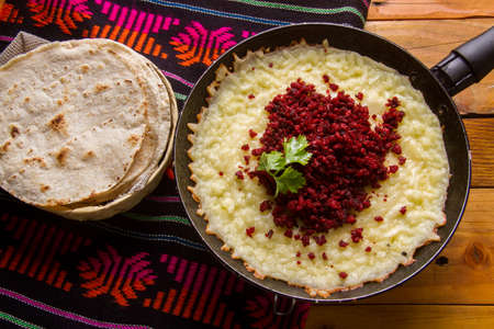 Authentic mexican melted cheese with Chorizo