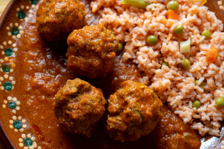 Traditional mexican meatballs with red riceの写真素材