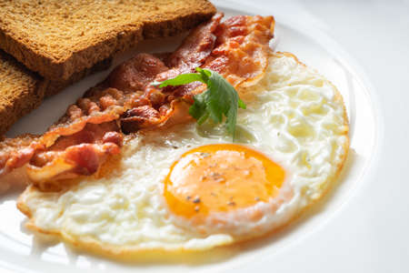 Fried egg with baconの写真素材